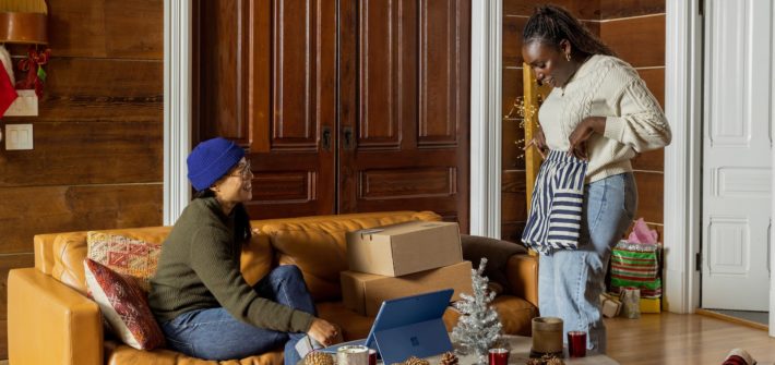 a group of people sitting around a living room